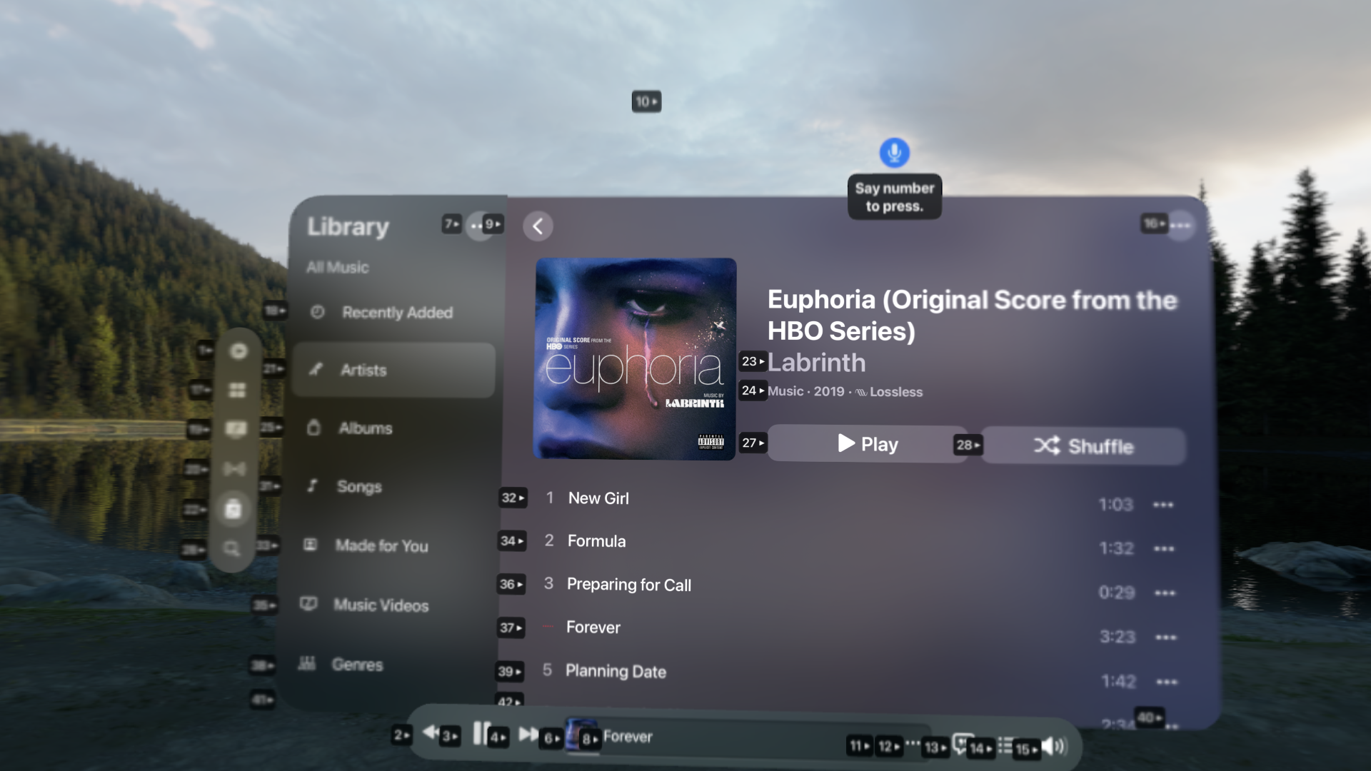 A screenshot of Apple Music after having said "Show Numbers". Popups appear on many UI elements calling out how you can refer to them by number, each having a unique number.